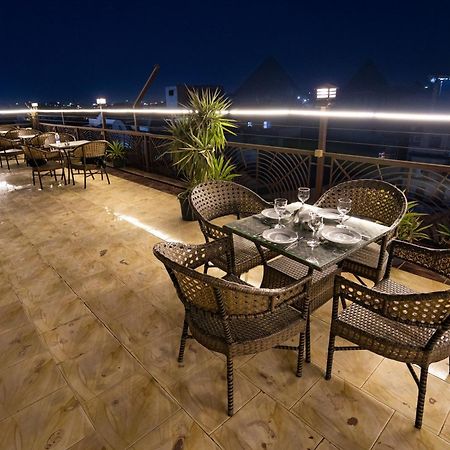 Отель Pyramids Gem Plaza Kafrat al Jabal Экстерьер фото